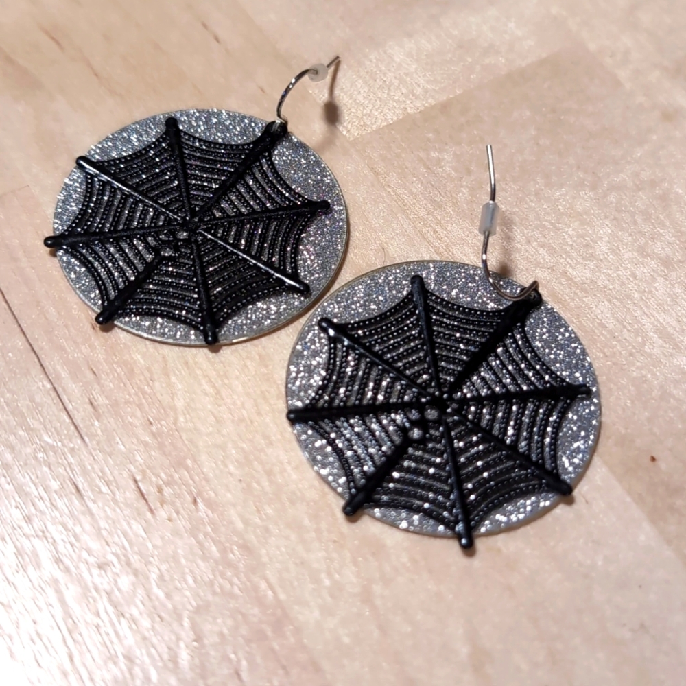 Black and gold web earrings